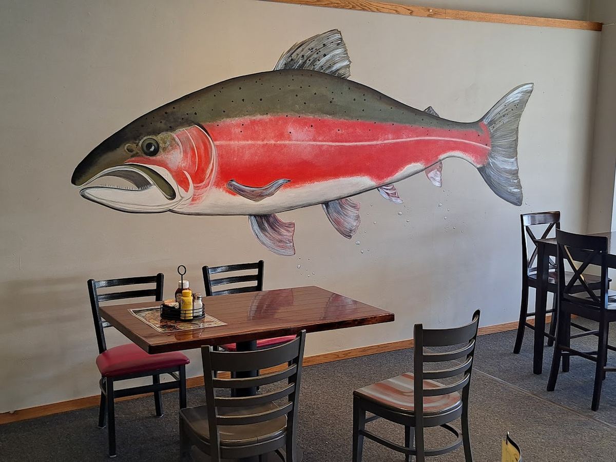 Dining room with the salmon mural
