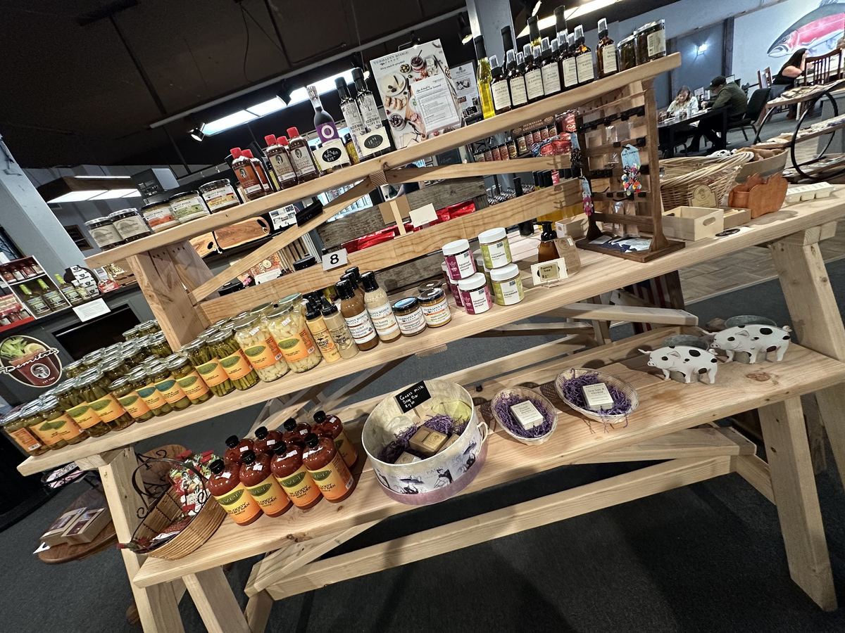 Artisan market shelves with local goods